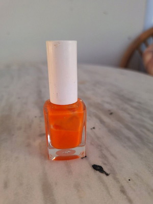Md orange fluorescent nail polish used