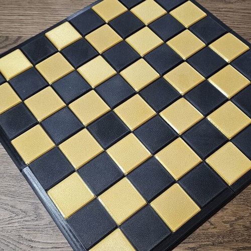 Chessboard in black and gold color, new