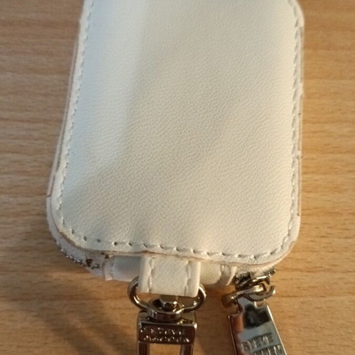 Steve Madden lighter case new, white with zipper and hook