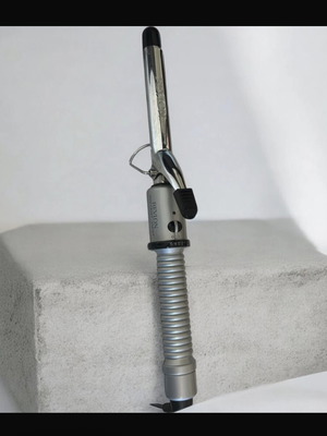 Revlon curling iron used with natural wear, versatile curls