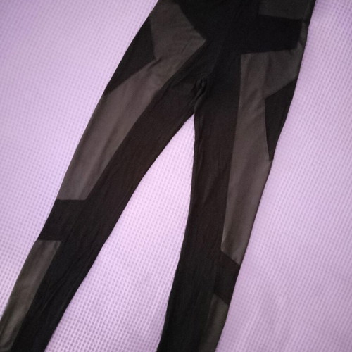 Women's black leggings XS new with vinyl patterns