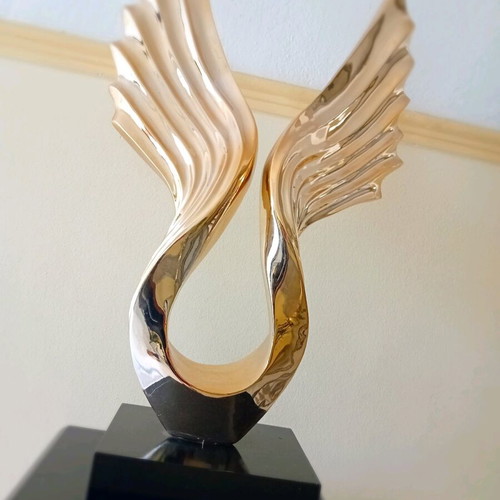 Wooden room decor like new with golden wings and hidden cabinet