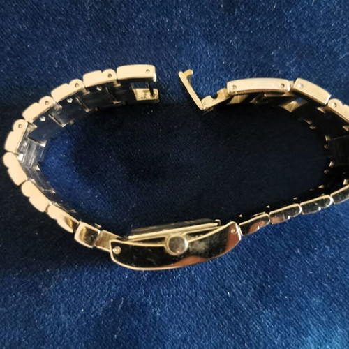 Timex women's quartz watch with used silver metal bracelet