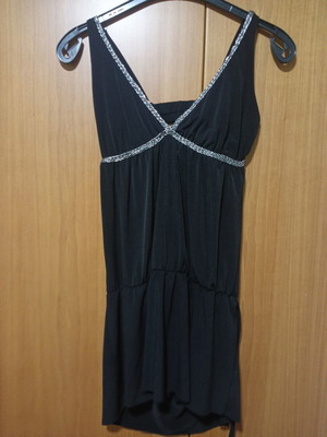 Mini dress with silver knitted detail on chest size Medium like new