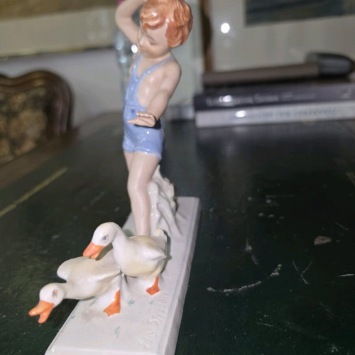 Royal Dux porcelain figurine child with geese used