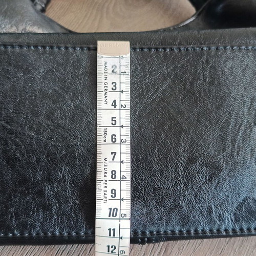 Handbag new with strap, black synthetic leather
