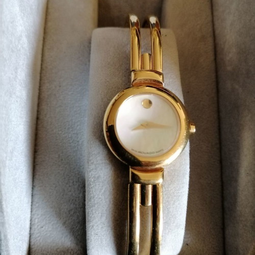 Movado women's watch like new with bracelet and sapphire crystal
