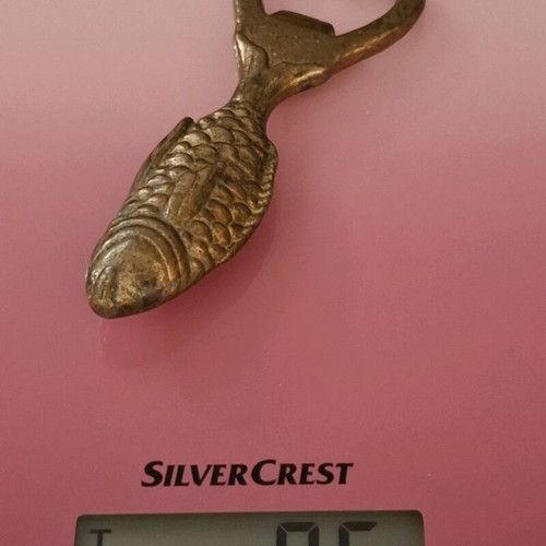 Vintage brass fish-shaped bottle opener used