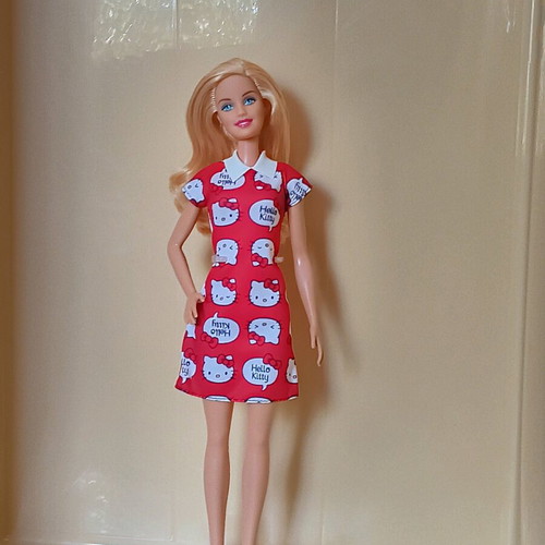 Barbie Fashion Avanue in petite body with Hello Kitty Fashion dress used