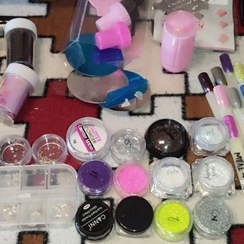 Large nail art set like new with glitter, foil, rhinestones, and decorations