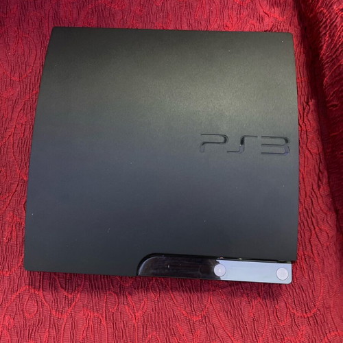 PlayStation 3 slim used, with two controllers