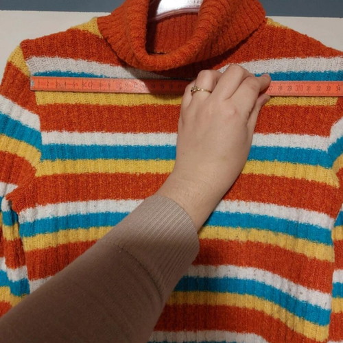Simple colorful knitted turtleneck sweater