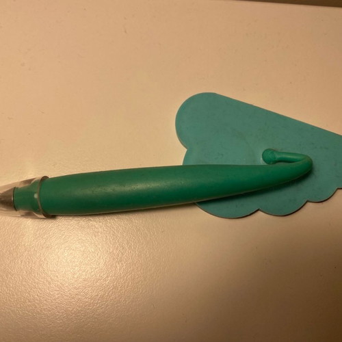 Pen used with cloud design in blue color