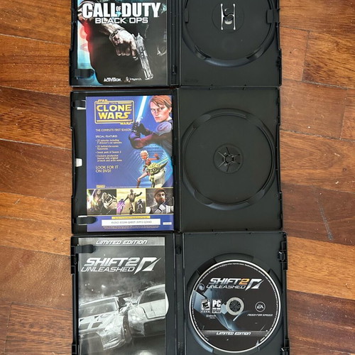 Set of one game and two empty cases used