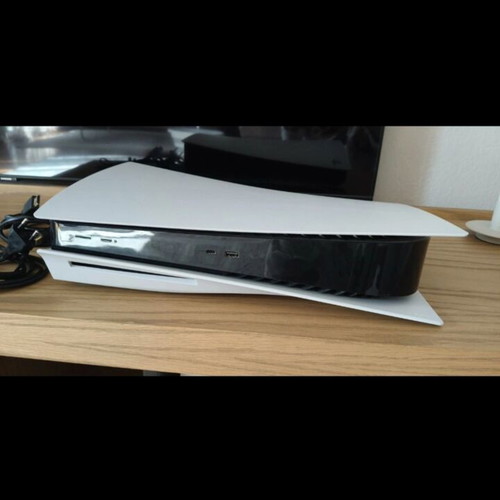 PlayStation 5 like new with 8 games and 2 controllers
