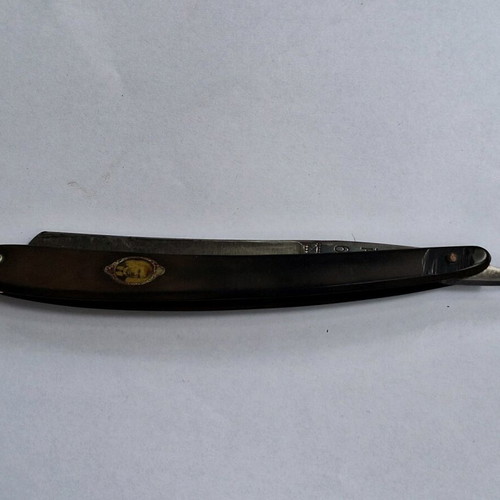Tiger Solingen straight razor used with photo on handle
