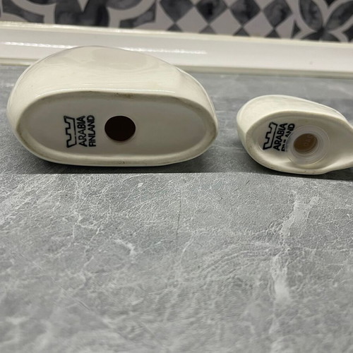 Arabia salt and pepper shakers set used, big and small size, one missing cap