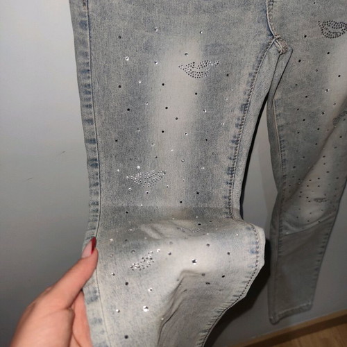 Low-rise jeans used with decorative rhinestones, gray