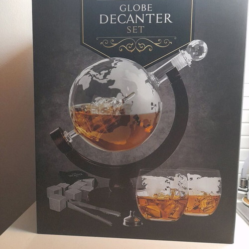 Glass decanter with globe design and accessories, new