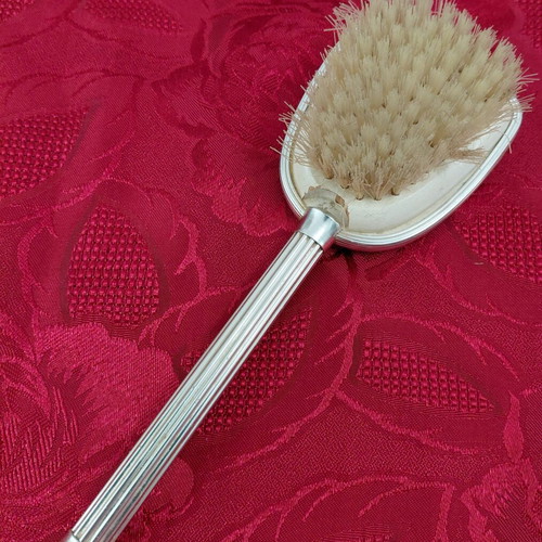 Vintage boudoir clothes brush from the 1970s, used