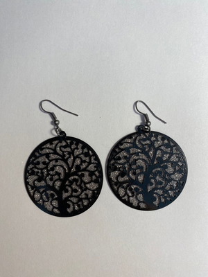 Earrings used with embossed black design
