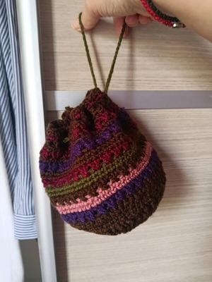 Knitted pouch bag like new, multicolored