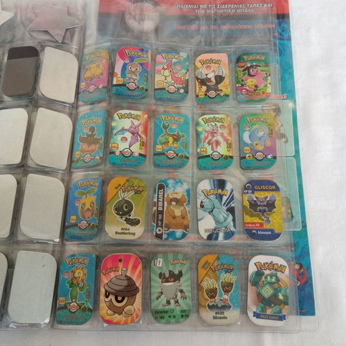 Collectible album with 132 Pokemon metal tags