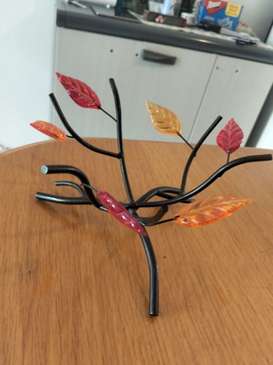 Decorative table ornament with flower designs, like new