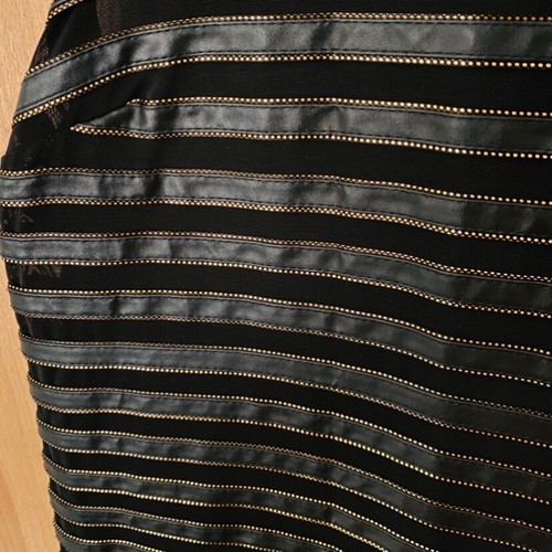 Dress black size M like new with gold details and leatherette
