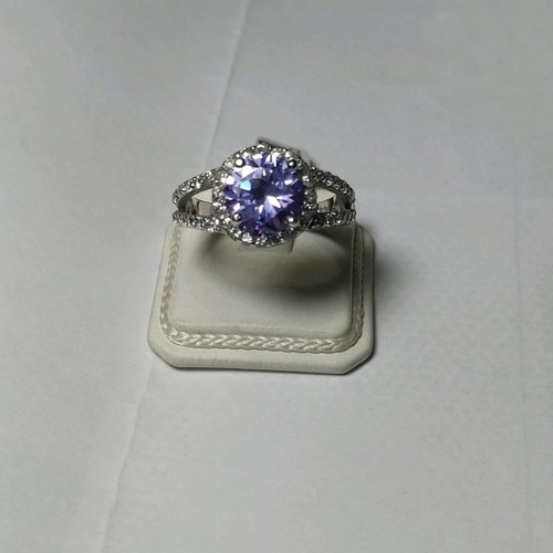 Silver (925) ring new with purple stone and smaller stones