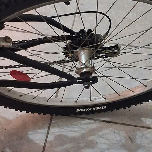 Mountain bike black used with front and rear suspension, V-brakes