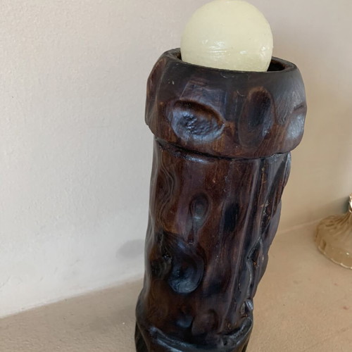 Wooden carved candlestick with embossed decoration