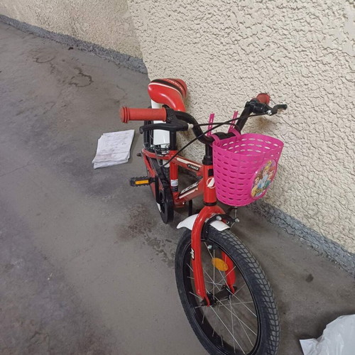 BMX bike 18" red for children, used with training wheels and basket