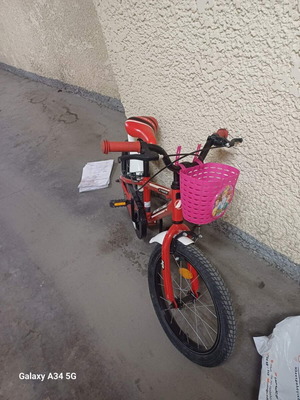 BMX bike 18" red for children, used with training wheels and basket