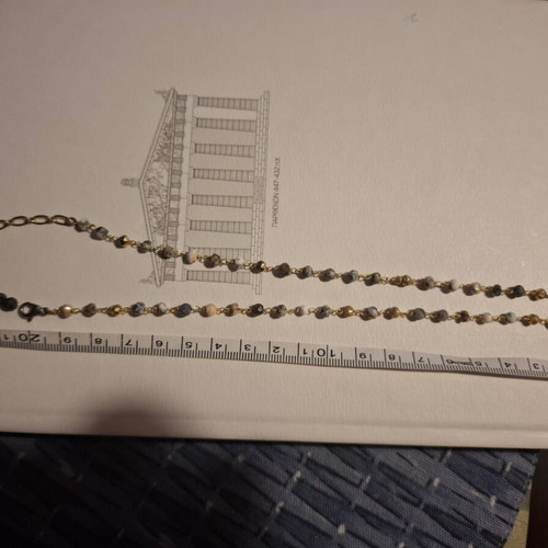 Handmade necklace like new with bicolor beads and gold elephant detail