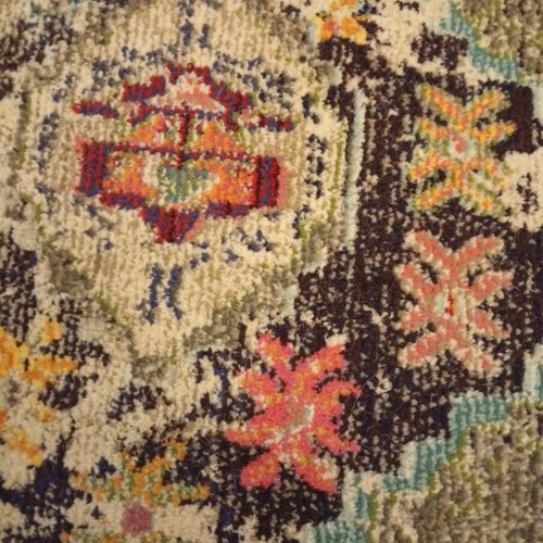 Colorful oriental style rug with distressed look like new