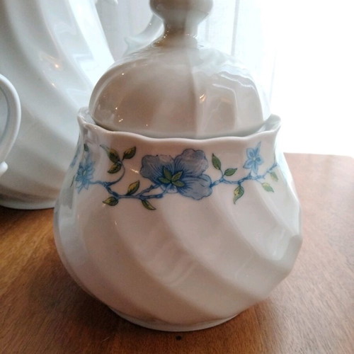 Vintage tea and coffee set in white porcelain like new