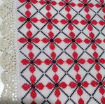 Large embroidered table runner used with handmade lace