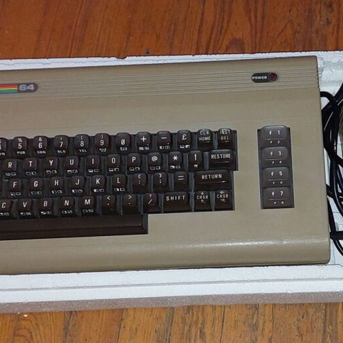 Commodore 64 like new with original box and warranty sticker