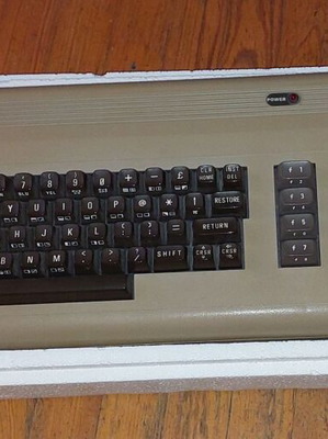 Commodore 64 like new with original box and warranty sticker