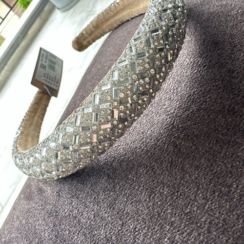 Hair accessory new, silver with tag