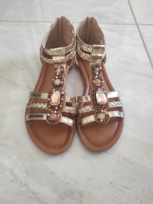 Women's gold sandals with stones like new, size 41