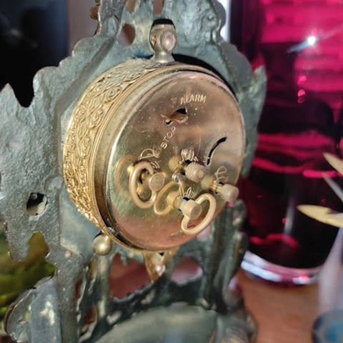 Vintage baroque brass mechanical mantel clock.