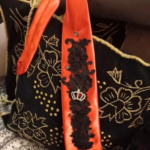 Red tie like new with pearls