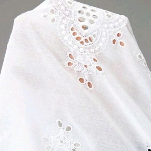 White sleeveless blouse new, romantic boho style with eyelet embroidery