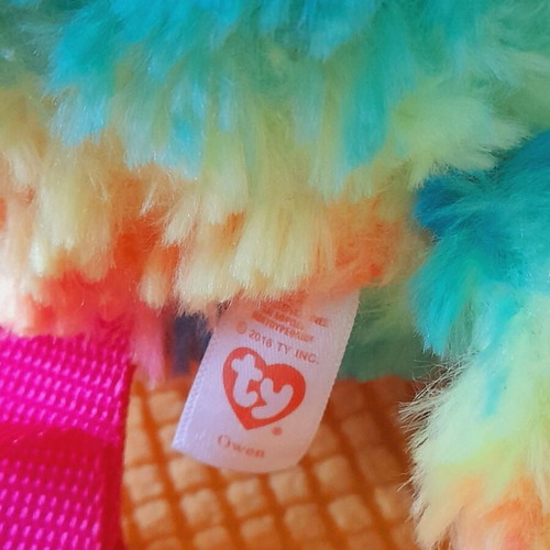 Ty plush backpack with owl design like new, multicolored