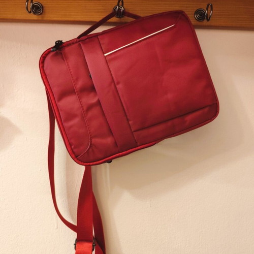 Waterproof red shoulder and hand bag for tablet