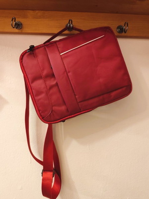 Waterproof red shoulder and hand bag for tablet