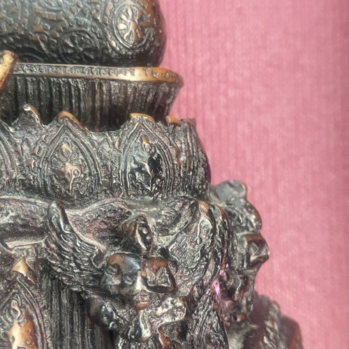 Thai Buddha statue with detailed embossed decoration
