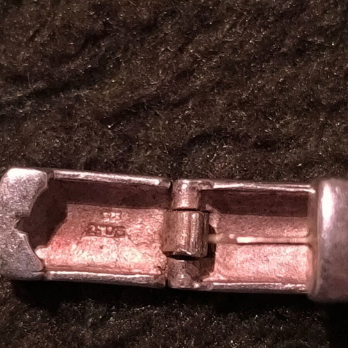 Silver earrings used with geometric shape and hinged clasp
